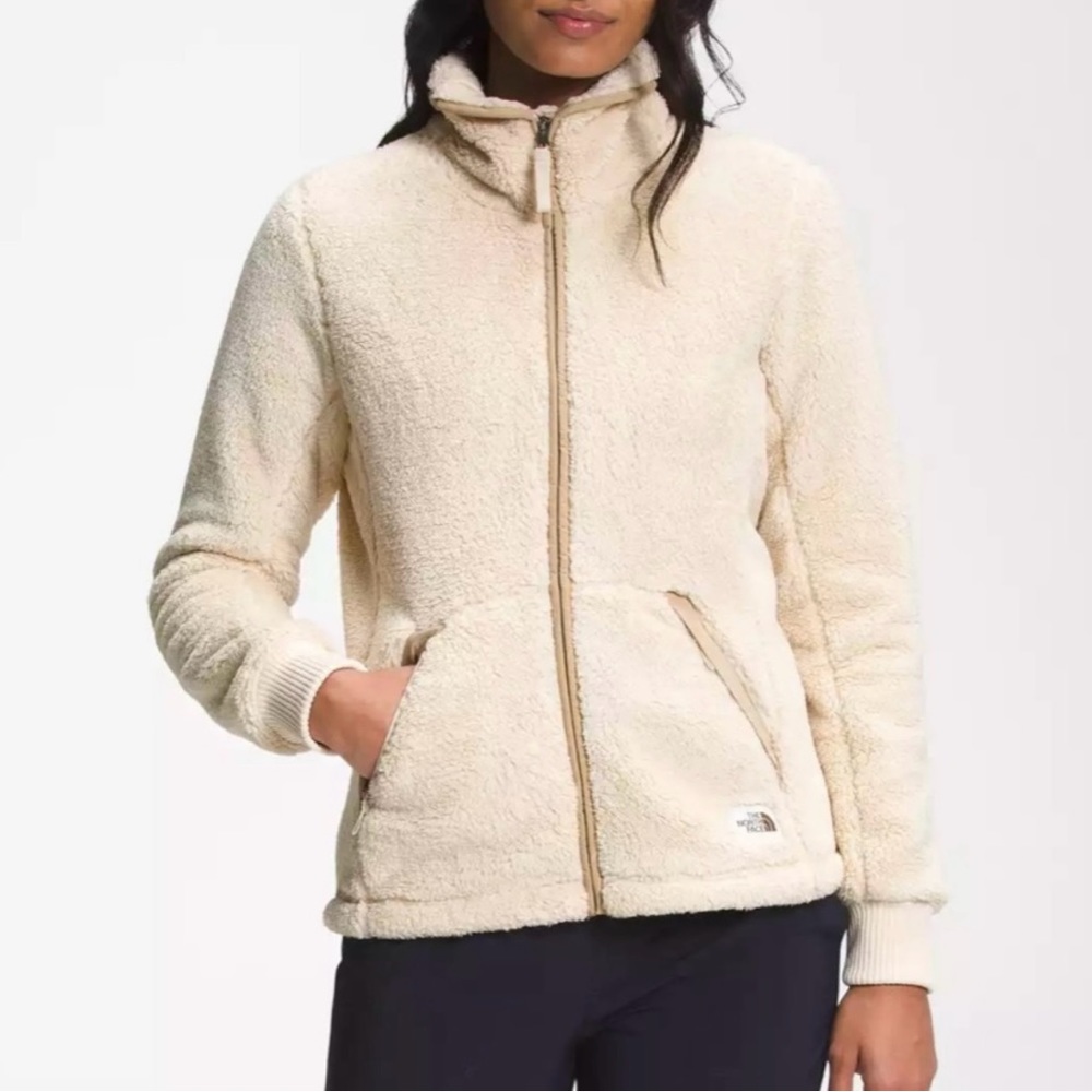 The North Face cream Sherpa zip up jacket.